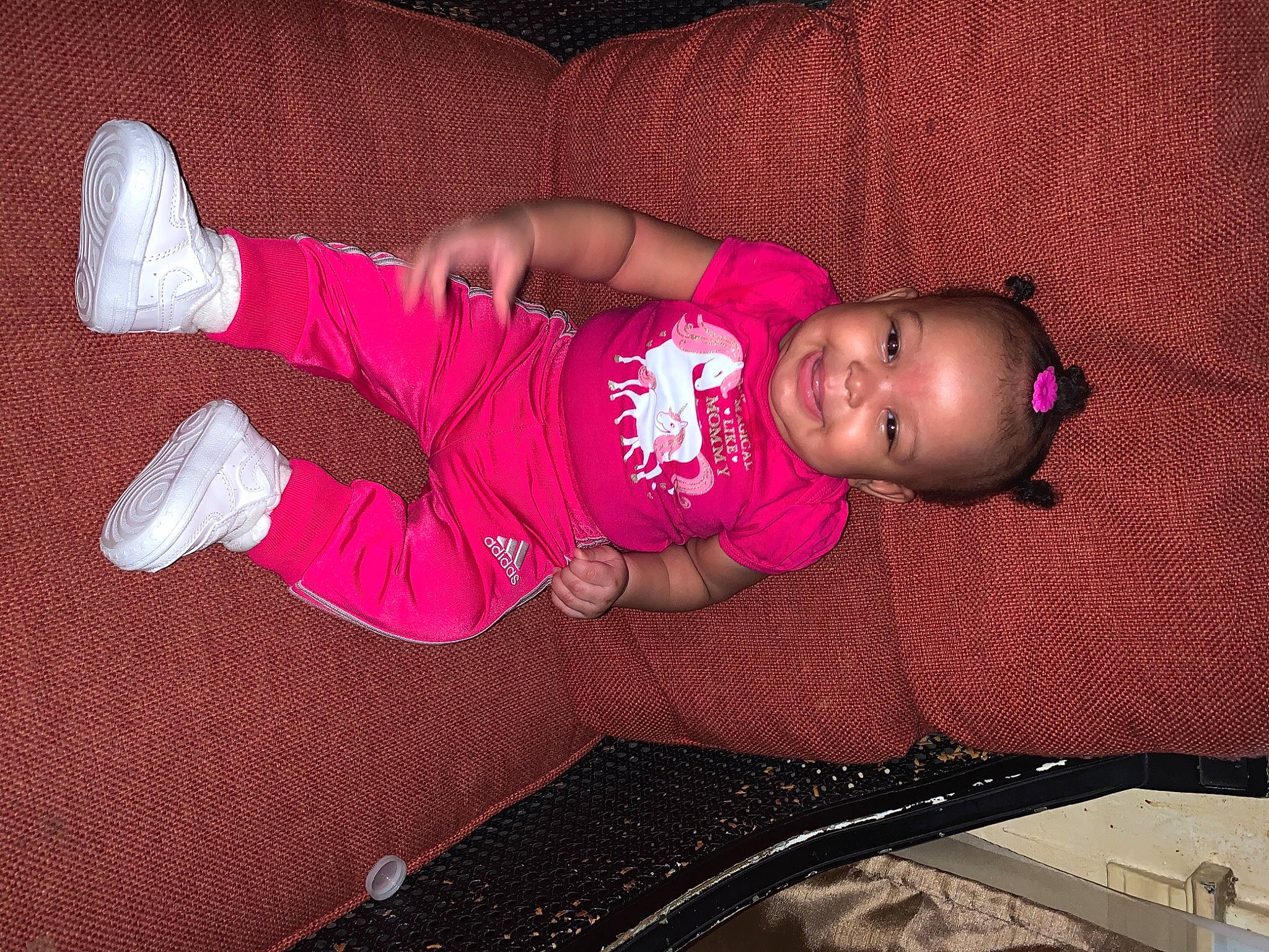 Kelsea is registered to the contest to win money with this photo: baby, baby_products, baby_toddler_clothing, cheek, child, joy, magenta, mouth, nightwear, person, pink, purple, sock, toddler