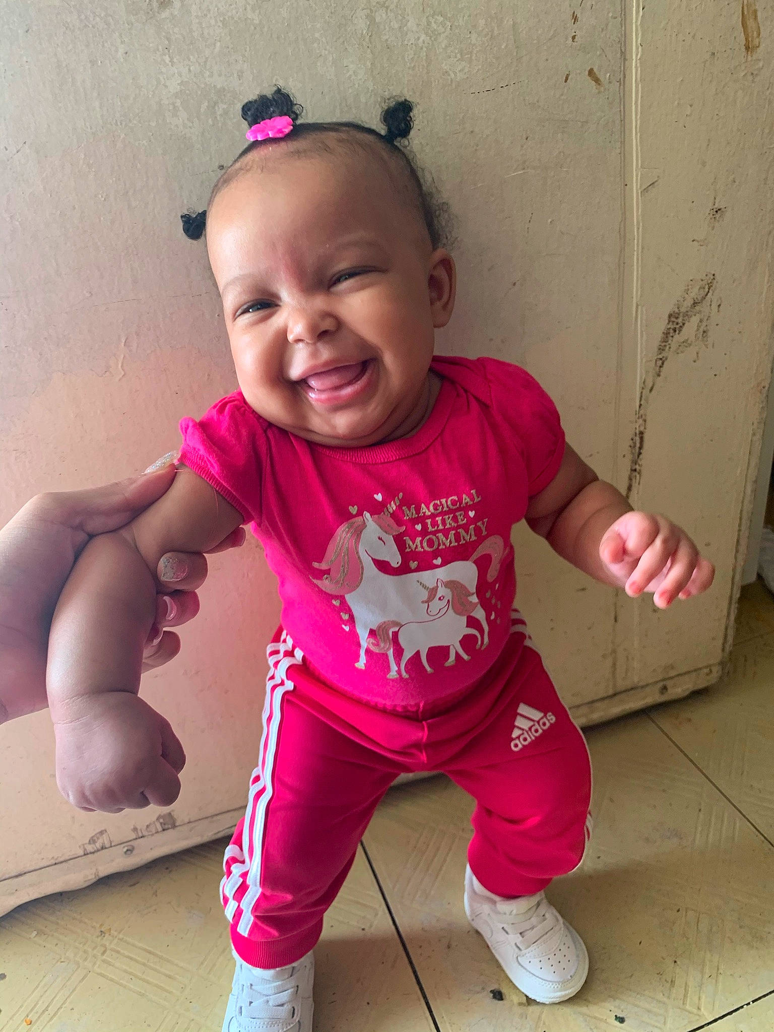 Kelsea joined the competition — help win amazing prizes! arm, baby, baby_toddler_clothing, cheek, child, cool, hand, human_body, joy, laugh, magenta, mouth, nose, person, pink, shoe, shoulder, sleeve, sneakers, toddler