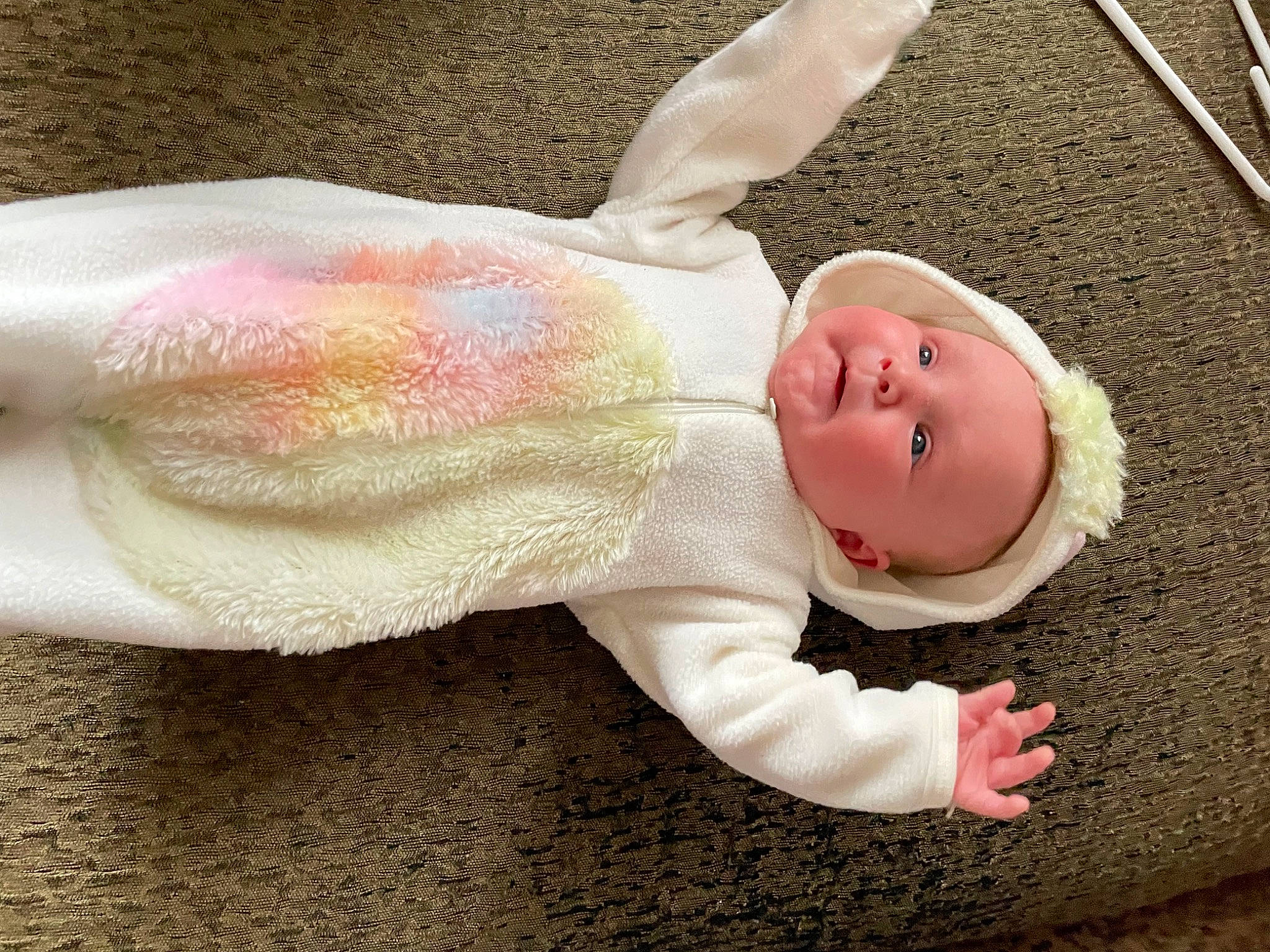 Paisley is registered to the contest to win money with this photo: baby, baby_products, baby_safety, baby_toddler_clothing, cheek, child, comfort, ear, eye, finger, gesture, happy, head, headgear, human_body, person, pink, skin, sleeve, smile