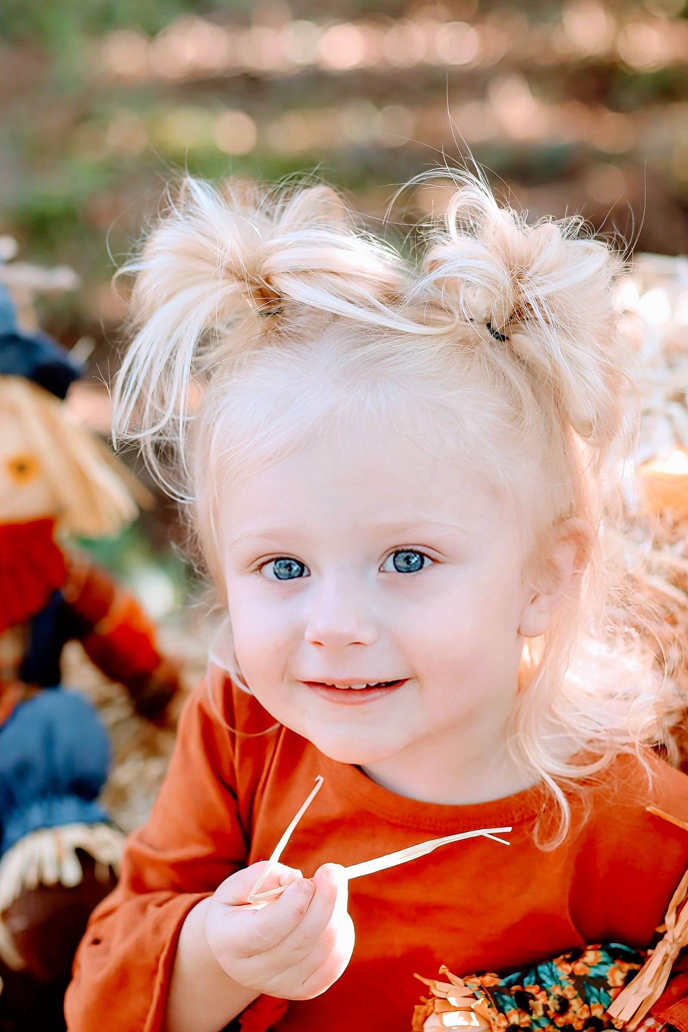 Harper is registered to the contest to win money with this photo: baby, baby_toddler_clothing, child, event, eye, face, facial_expression, flash_photography, fun, grass, happy, headpiece, iris, jewellery, joy, people_in_nature, person, sitting, skin, smile