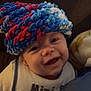 Stetson joined the competition — help win amazing prizes! baby, smiling, hat, knitted, colorful, bib, indoor, face, cute, child, young, happy, cozy, portrait, person, apparel, text, fabric, headwear, infant