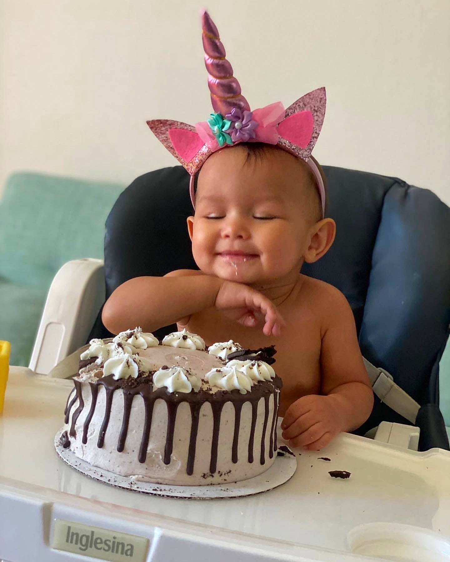 Novva is registered to the contest to win money with this photo: baked_goods, birthday_party, cake, cake_decorating, cake_decorating_supply, cap, chair, costume_hat, face, food, hat, joy, party_hat, party_supply, person, plate, smile, sugar_cake, table, tableware