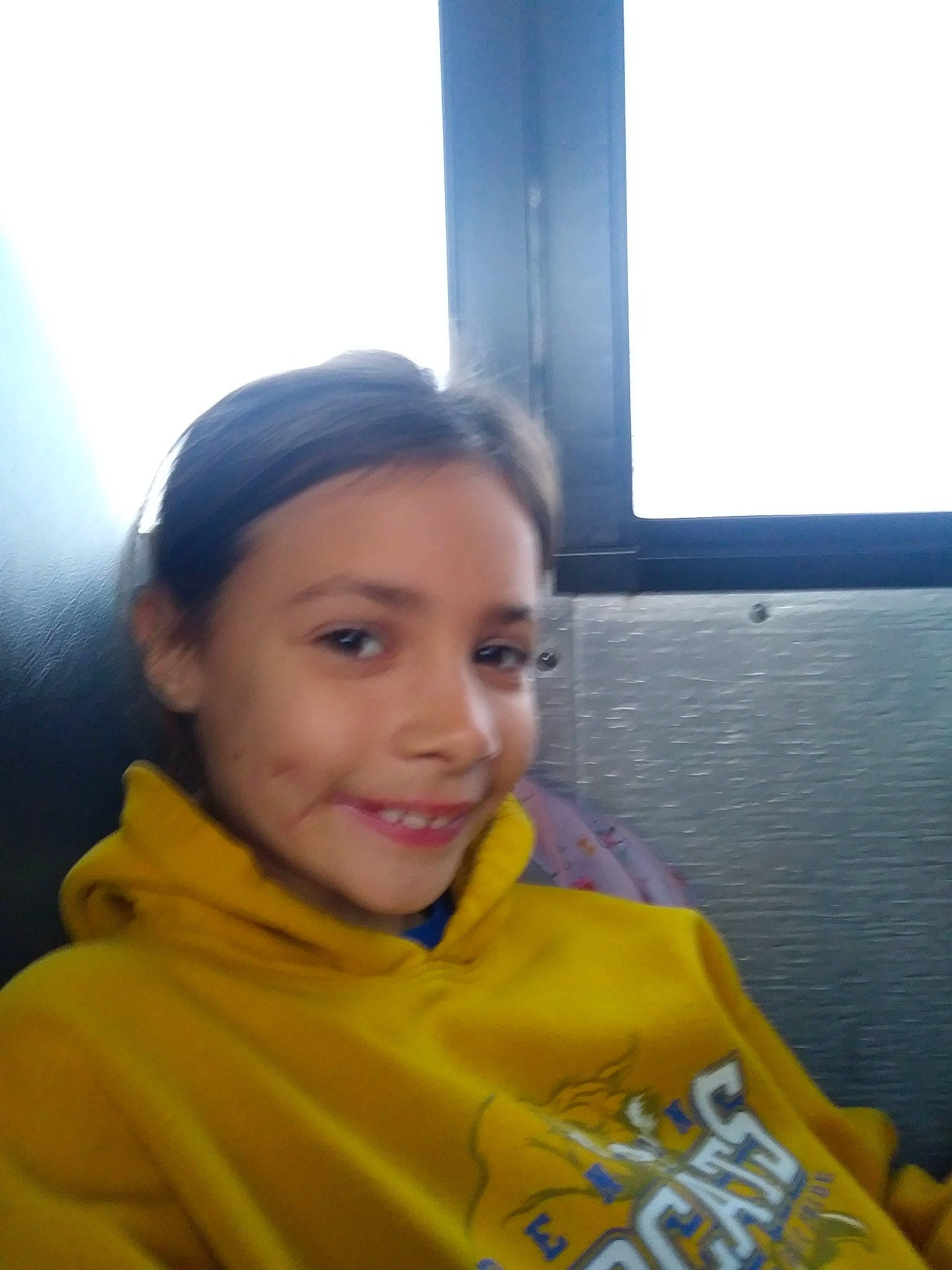 Karley joined the competition — help win amazing prizes! child, face, forehead, head, joy, neck, person, photography, selfie, smile, yellow