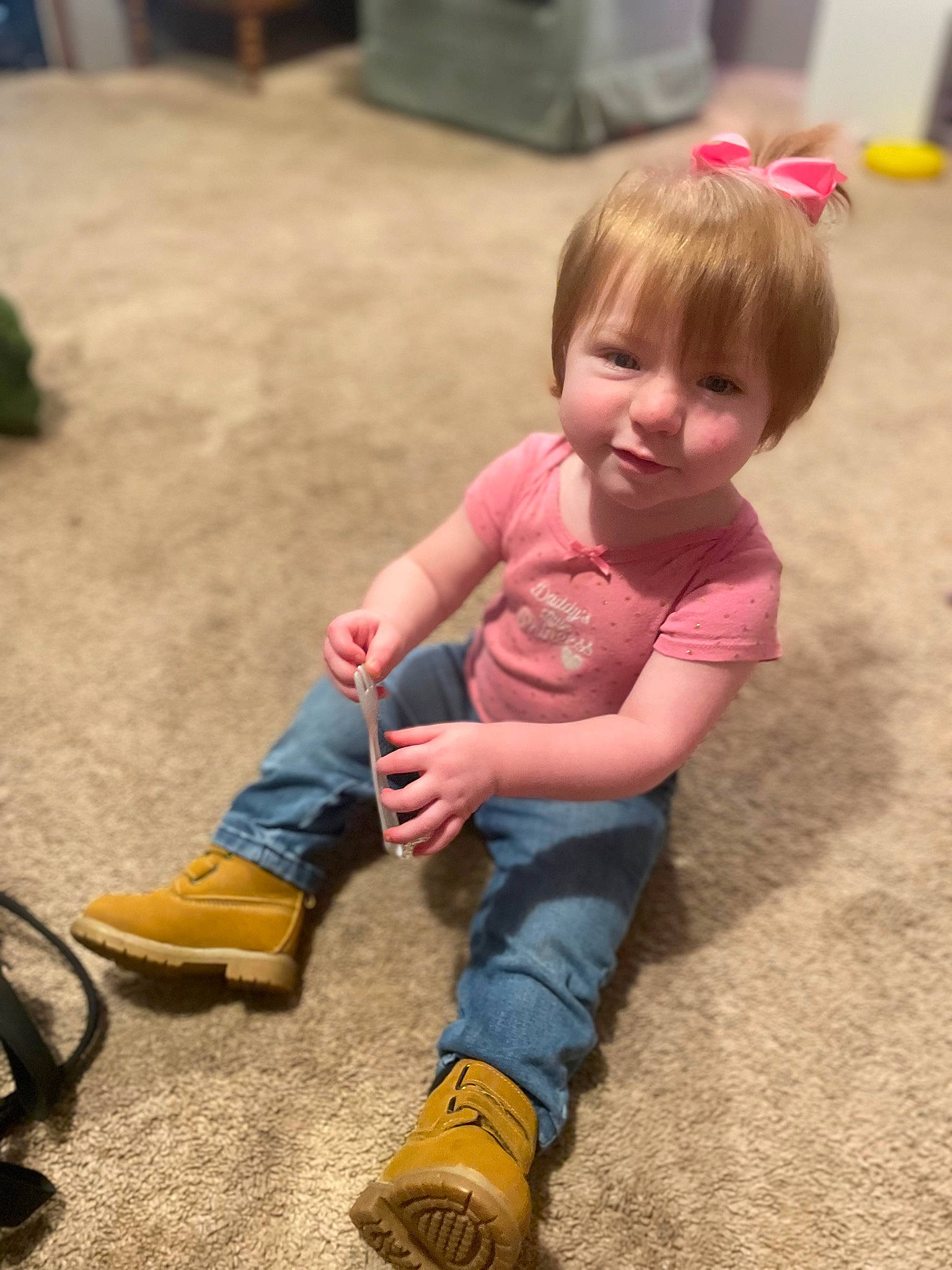 Eilzbeth is registered to the contest to win money with this photo: baby_toddler_clothing, cheek, finger, flooring, fun, happy, head, human_body, human_leg, jeans, joint, knee, leg, leisure, people_in_nature, person, skin, sock, thigh, toddler