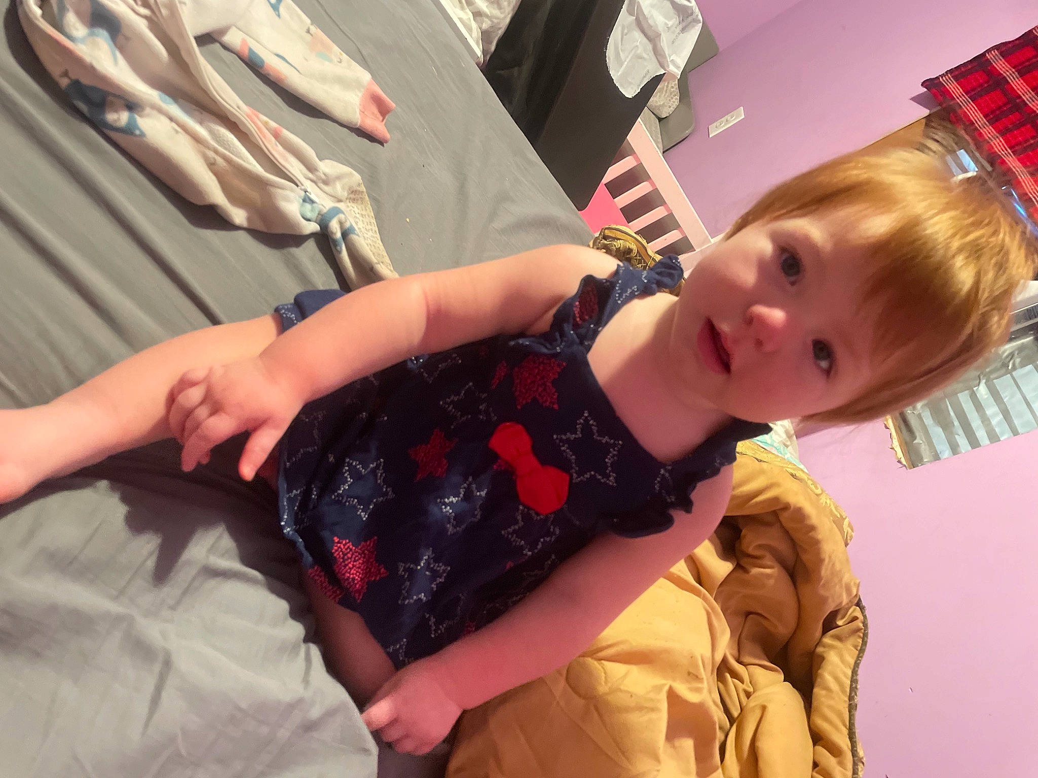 Eilzbeth joined the competition — help win amazing prizes! bangs, child, dress, eyelash, fashion_accessory, fashion_design, fun, gesture, happy, nail, pattern, person, pink, room, sitting, skin, sleeve, smile, textile, toddler