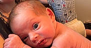 Kayelynn joined the competition — help win amazing prizes! baby, infant, toddler, child, adult, family, portrait, selfie, sitting, lying_down, wide_eyes, glasses, nose_ring, short_hair, diaper, clothing, indoor, home, shelf, funny_face