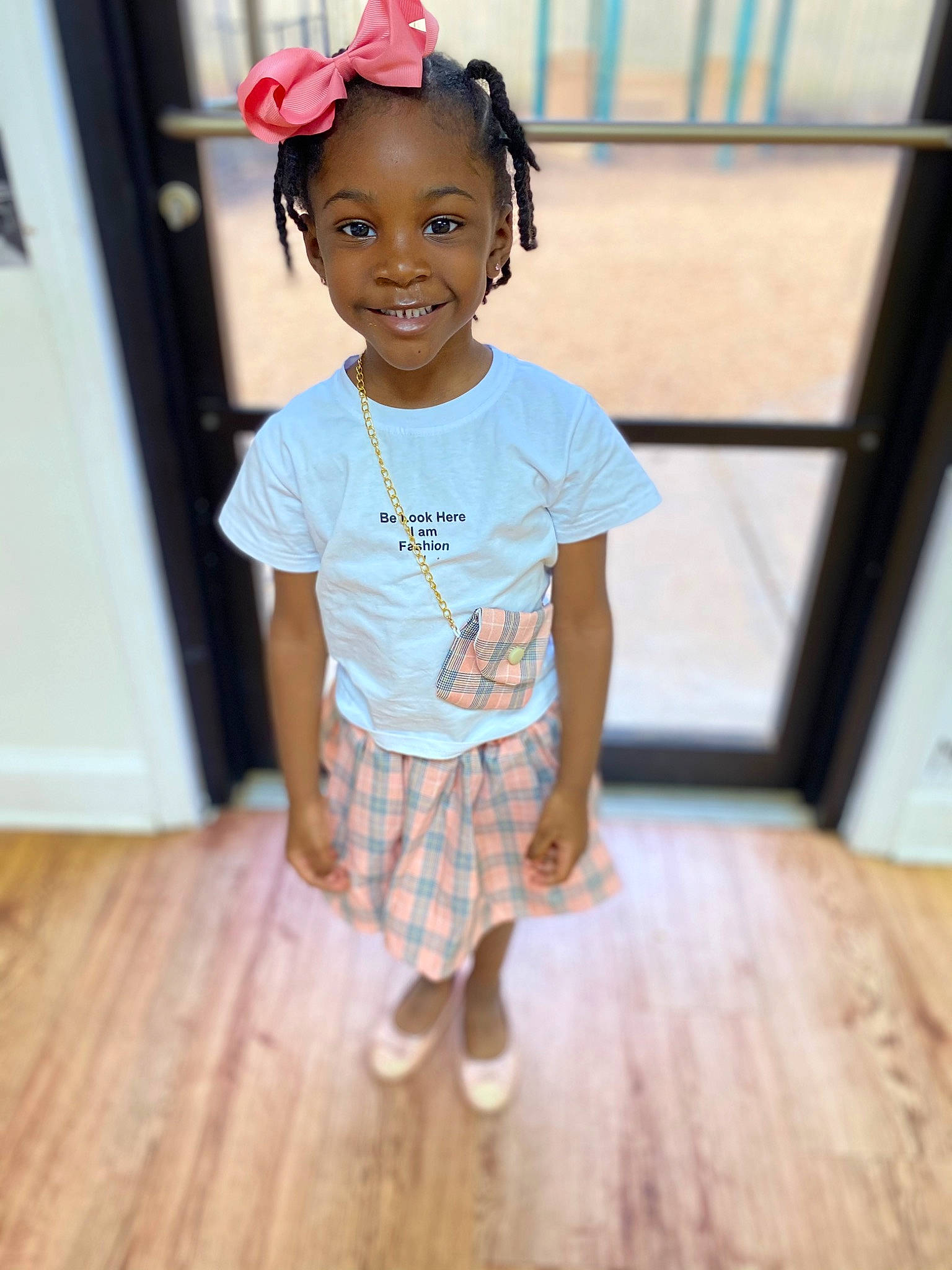 Skyler joined the competition — help win amazing prizes! baby_toddler_clothing, child, dress, eye, face, floor, flooring, footwear, happy, hardwood, joy, leg, person, plaid, shorts, skin, sleeve, smile, toddler, waist