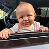 Steven joined the competition — help win amazing prizes! baby, car, child, clothing, curious, daylight, door, face, glass, hair, hands, interior, outdoor, overalls, portrait, reflection, seat, smile, steering_wheel, window