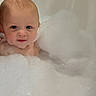 Steven is registered to the contest to win money with this photo: baby, bubble_bath, foam, water, bathtub, child, face, blue_eyes, skin, wet_hair, bathroom, cute, infant, young_child, clean, relaxation, portrait, indoor, small_person, playful