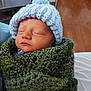 newborn, baby, sleeping, hat, knitted, blanket, green, blue, cozy, infant, portrait, child, indoor, warm, soft, face, headwear, wrapped, peaceful, cute