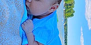 Elijah joined the competition — help win amazing prizes! baby, sleeping, blanket, outdoor, nature, water, lake, sky, clouds, greenery, trees, peaceful, infant, toddler, blue_clothing, relaxation, portrait, summer, daytime, rest