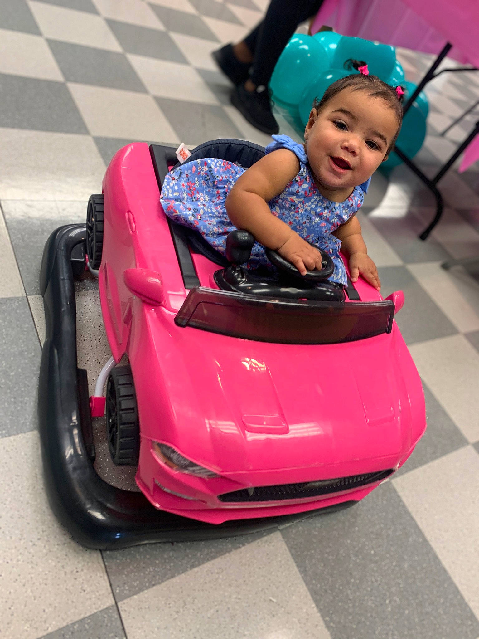 Aaliyah joined the competition — help win amazing prizes! automotive_design, automotive_exterior, automotive_lighting, automotive_tire, automotive_wheel_system, baby, bumper, car, fender, happy, motor_vehicle, person, pink, riding_toy, rim, smile, tire, toddler, travel, vehicle
