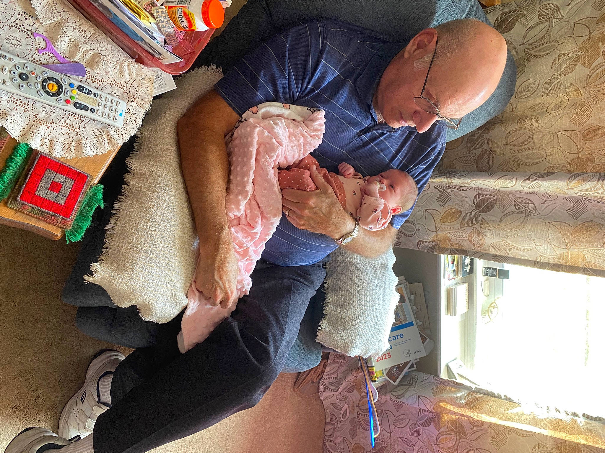 Eliana joined the competition — help win amazing prizes! baby, baby_products, child, comfort, fun, gesture, happy, hat, lap, leg, leisure, linens, people, person, room, shorts, sitting, smile, thigh, toddler