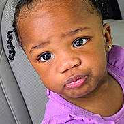 Aeris joined the competition — help win amazing prizes! child, toddler, portrait, close_up, car_seat, curly_hair, purple_clothing, cute, face, expression, puffed_hair, earrings, young, person, indoors, seat, casual, looking_away, skin, baby
