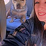 woman, dog, car_interior, seat, smile, selfie, sunlight, jacket, seatbelt, headrest, pet, happy, portrait, casual, backseat, animal, friendship, indoor, leisure, travel