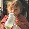 Elyna participe au concours pour gagner de l'argent avec cette photo : baby, bottle, child, cloth, cozy, drinking, expression, eyes, face, gaze, hair, hand, indoor, milk, mouth, portrait, soft_light, stroller, sweatshirt, toddler