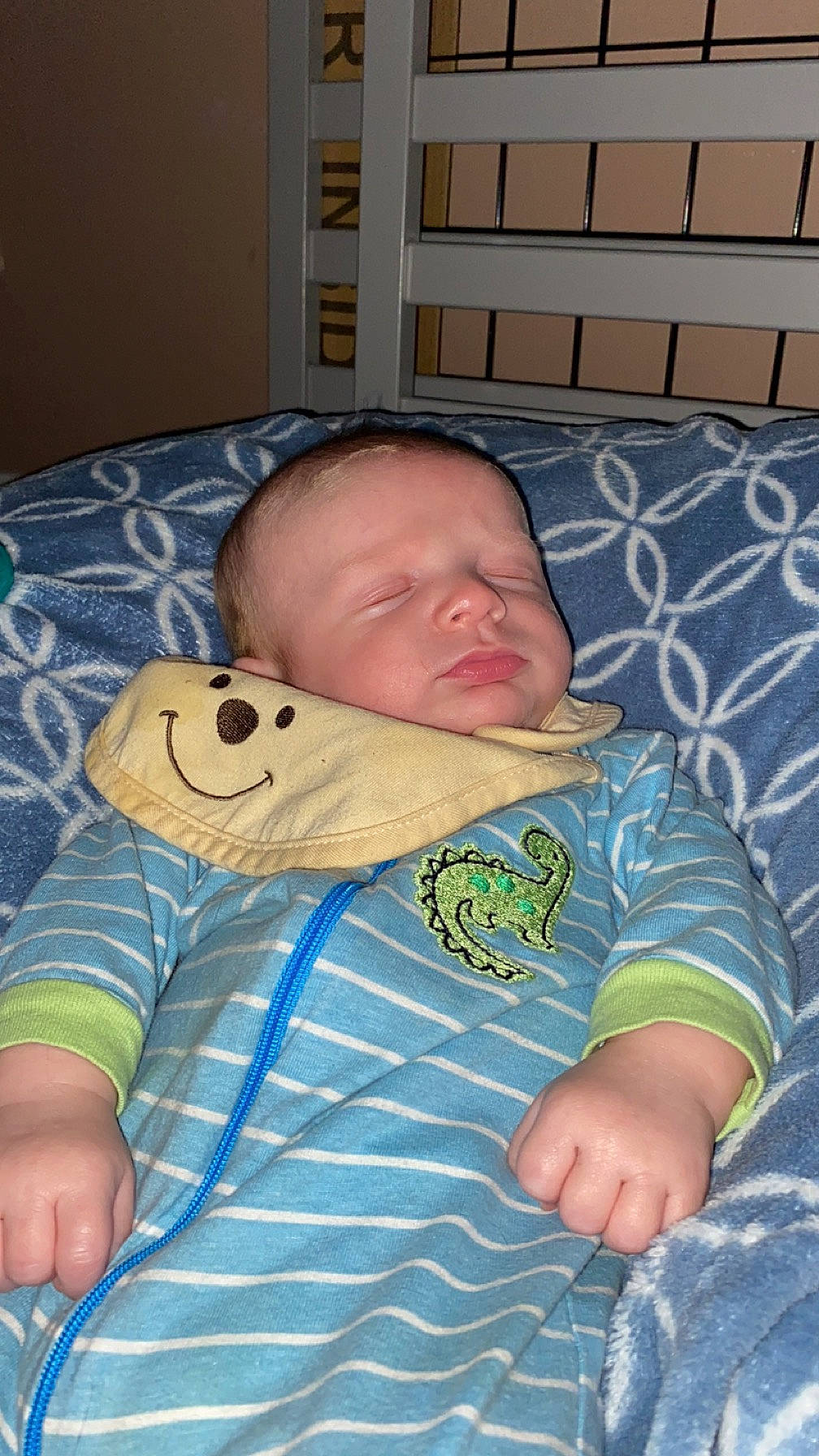 Daniel is registered to the contest to win money with this photo: baby, baby_products, baby_toddler_clothing, bedtime, cheek, child, chin, comfort, flooring, head, linens, mammal, mouth, person, room, sitting, skin, sleep, sleeve, textile