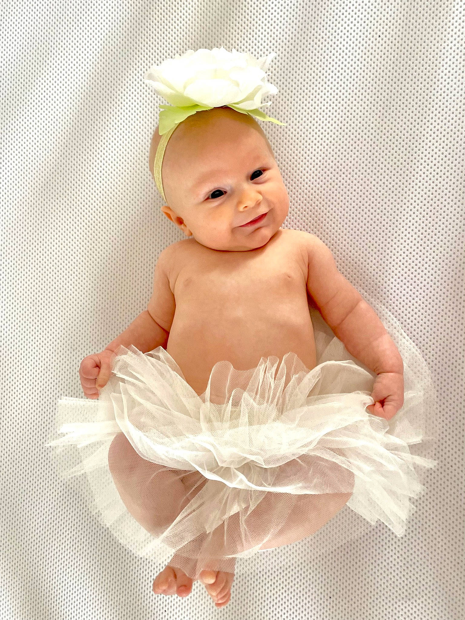 Rosie Blue joined the competition — help win amazing prizes! baby, baby_products, baby_sleeping, baby_toddler_clothing, child, comfort, fashion_accessory, flash_photography, hair_accessory, happy, headband, headgear, headpiece, linens, pattern, person, sitting, smile, thumb, toddler