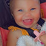 baby, smiling, blue_eyes, blanket, pacifier, car_seat, bow, child, happy, cute, face, infant, clothing, hand, portrait, seatbelt, closeup, skin, baby_girl, expressive