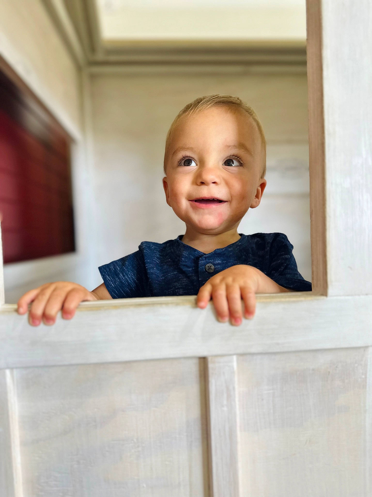 Layton is registered to the contest to win money with this photo: baby, baby_toddler_clothing, cheek, child, collar, dress, flooring, formal_wear, happy, joy, person, rectangle, room, sitting, sleeve, smile, standing, suit, t_shirt, thumb