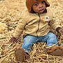 autumn, beanie, boots, casual, child, curious, cute, fall, hat, jacket, jeans, nature, outdoor, person, portrait, sitting, smile, straw, toddler, young