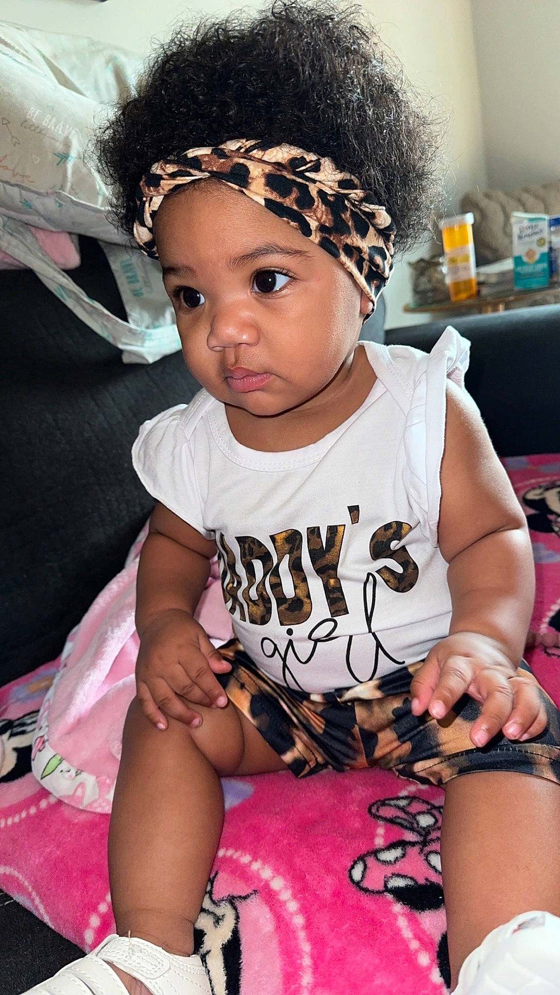 Emani is registered to the contest to win money with this photo: baby_toddler_clothing, beauty, black, child, cool, ear, eyelash, fashion_accessory, fashion_design, flash_photography, happy, head, headband, headpiece, headwear, jewellery, person, pink, skin, sleeve