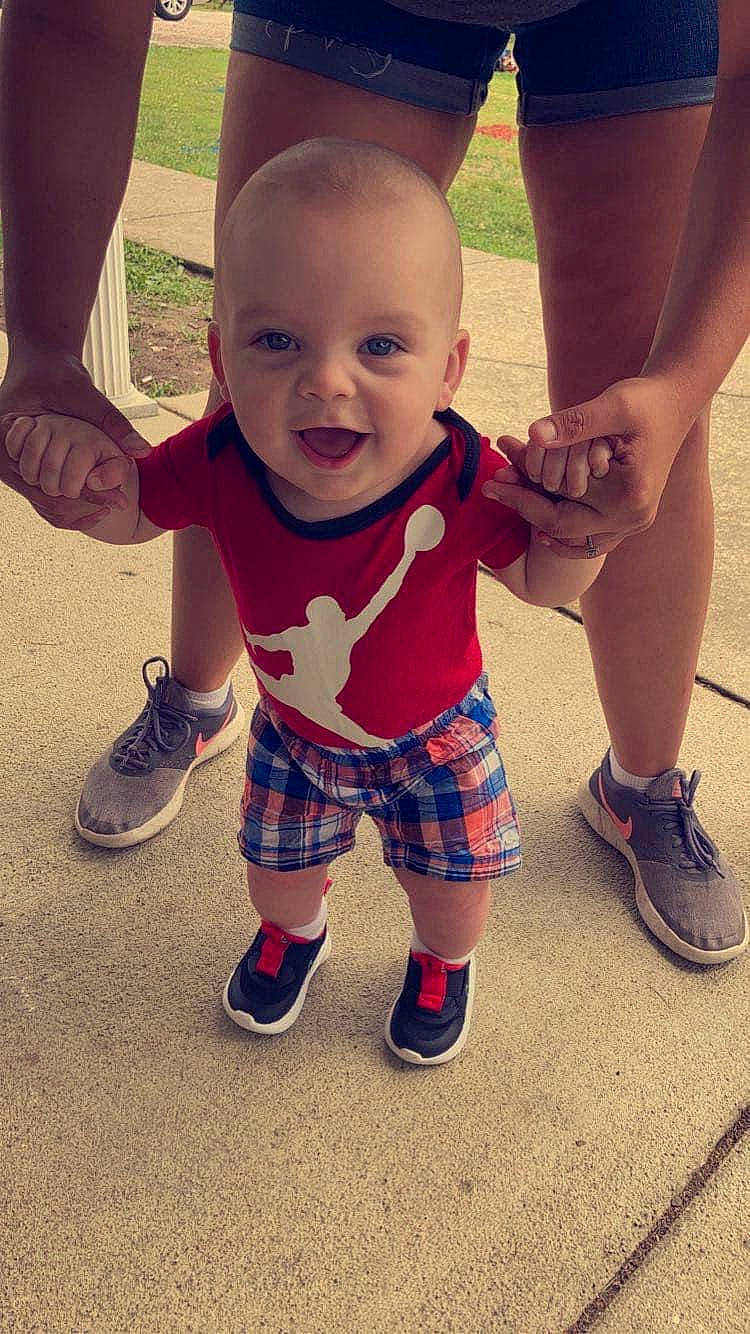 Weston joined the competition — help win amazing prizes! baby_toddler_clothing, child, cool, face, facial_expression, finger, footwear, gesture, hairstyle, happy, leg, person, product, shoe, shorts, sleeve, smile, sneakers, standing, tartan