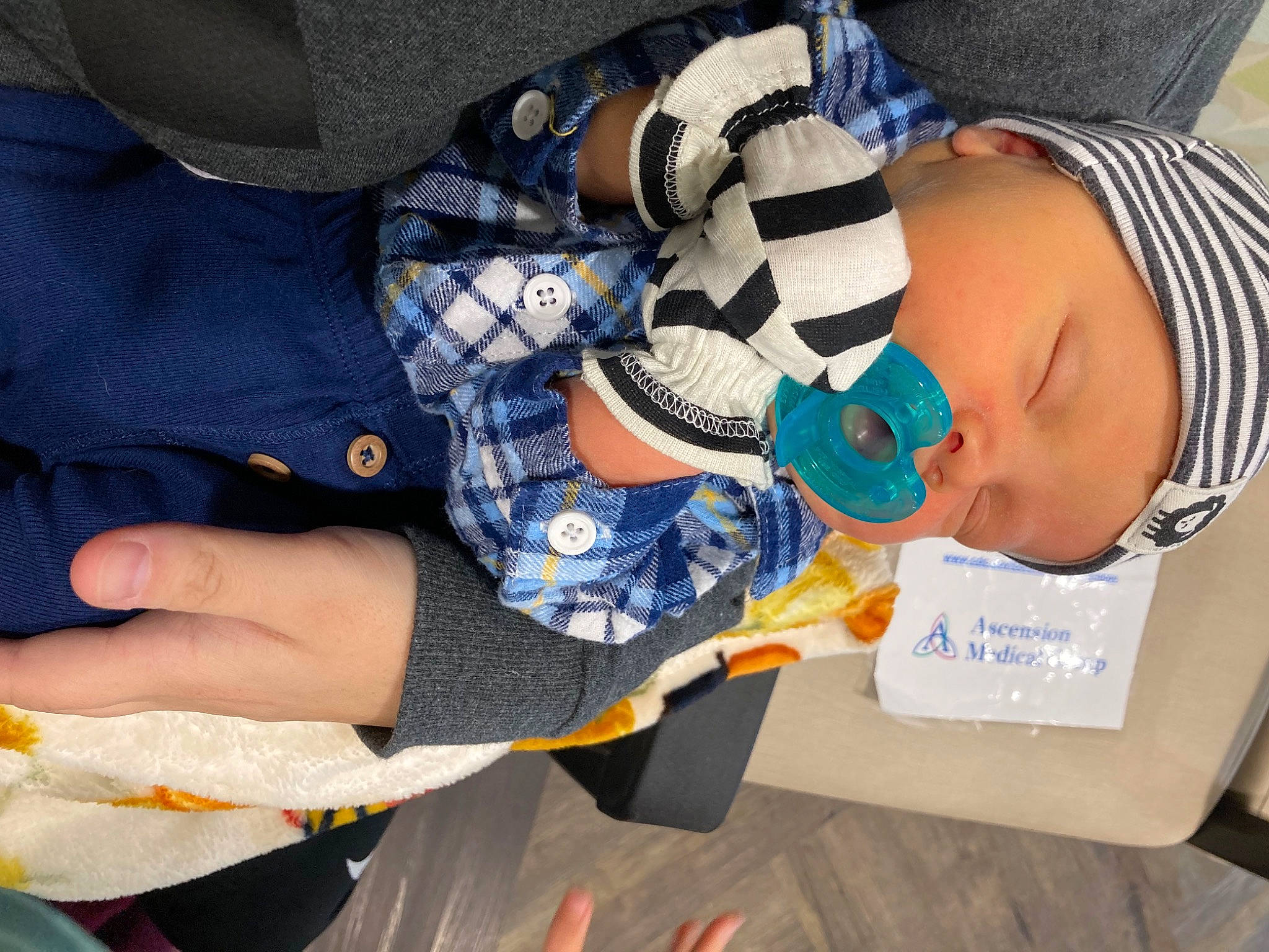 Weston joined the competition — help win amazing prizes! baby, baby_products, baby_toddler_clothing, child, comfort, electric_blue, eyewear, fashion_accessory, finger, headwear, human_body, nail, pattern, person, sitting, sleeve, sunglasses, thumb, toddler, wrist