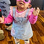 toddler, child, pink_sunglasses, flower_shaped_glasses, standing, wooden_floor, long_sleeve_shirt, dress, patterned_leggings, socks, indoor, person, hand, helping_hand, cute, smiling, fashion, playful, home, fun