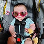 Nevaeh joined the competition — help win amazing prizes! baby, car_seat, sunglasses, pink, plush_toy, monkey_toy, infant, child, seatbelt, clothing, cute, indoor, portrait, toddler, face, head, sitting, accessory, funny, safe