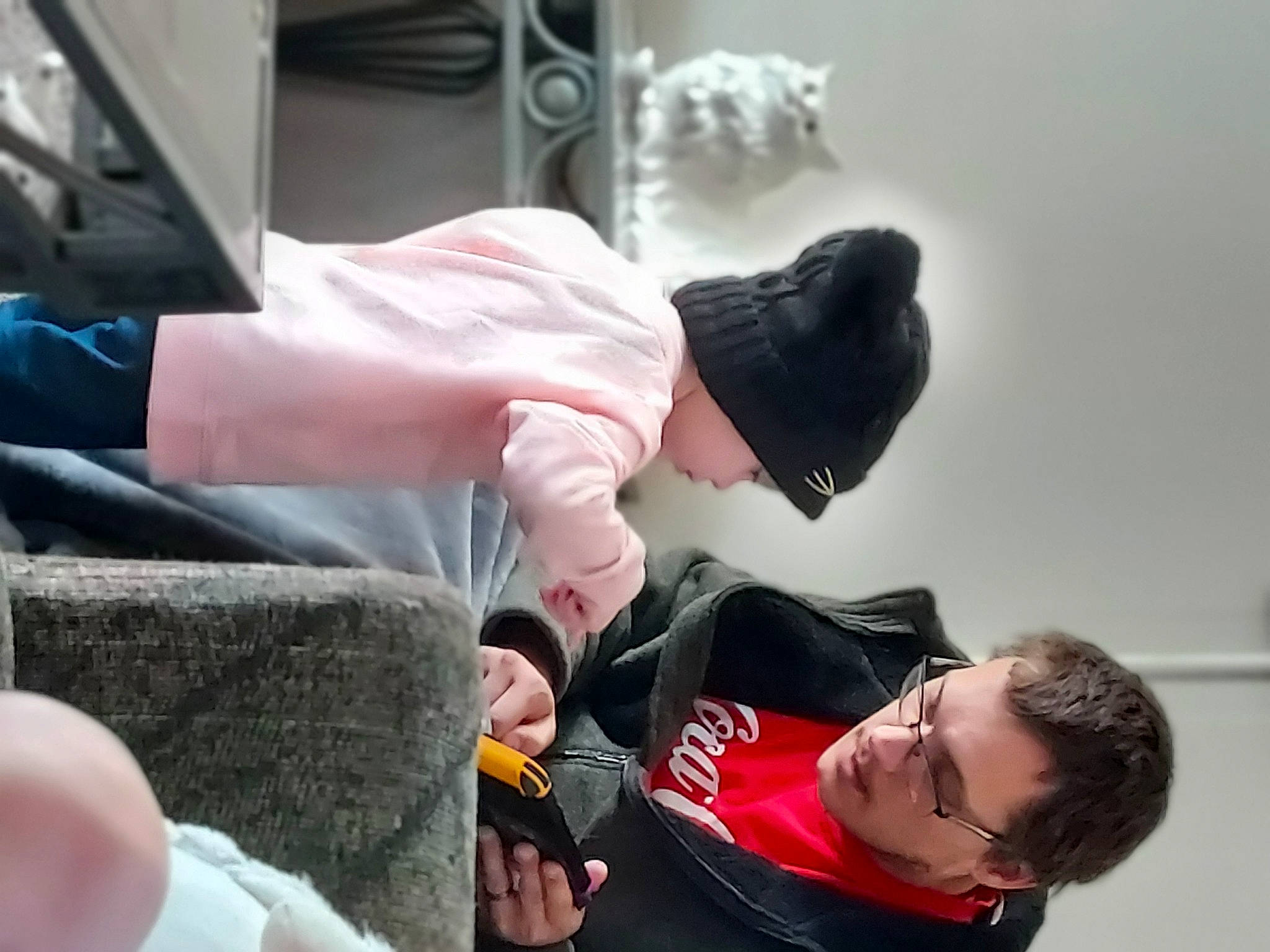 Rayla is registered to the contest to win money with this photo: child, elbow, event, finger, fun, gesture, hand, human, joint, nail, person, sitting, thumb, wrist