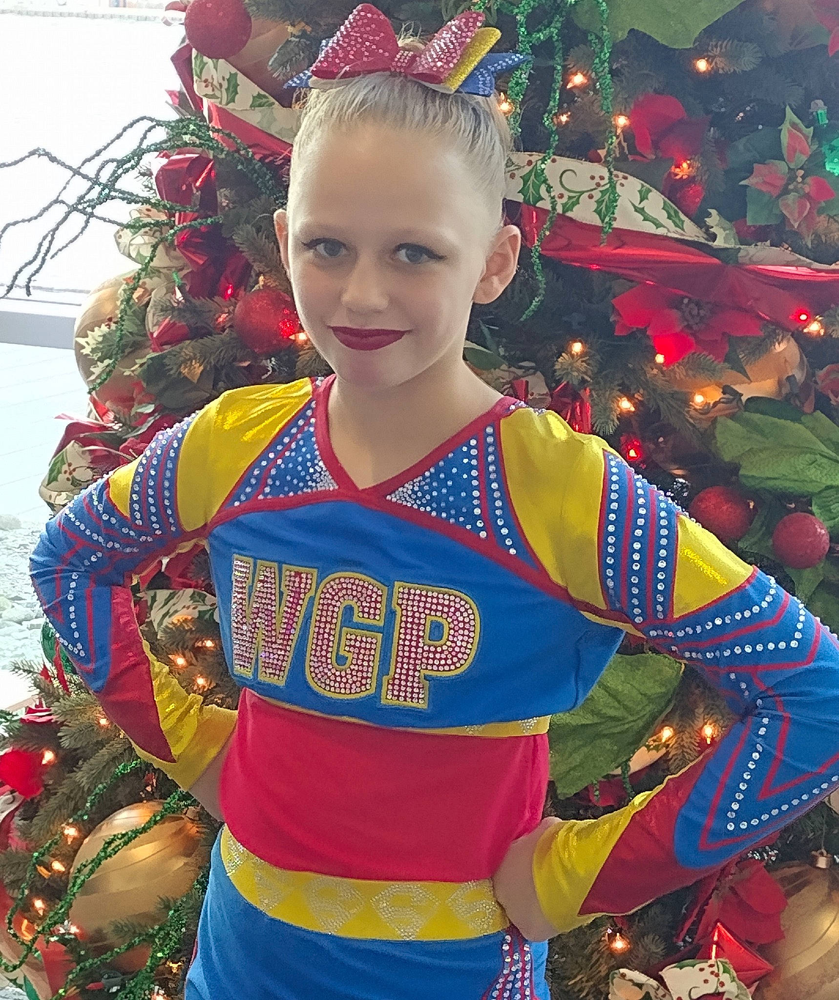 Kai'Lee joined the competition — help win amazing prizes! christmas_decoration, entertainment, event, eye, face, fashion_design, fun, glove, hair, happy, head, headgear, holiday, human_body, jewellery, joy, performing_arts, person, red, smile