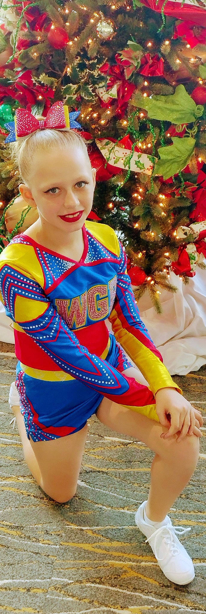 Kai'Lee joined the competition — help win amazing prizes! beauty, christmas_tree, electric_blue, event, facial_expression, fashion_design, fun, happy, human_body, human_leg, joy, neck, person, plant, red, sleeve, smile, street_fashion, thigh, trunk