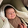 Nino participe au concours pour gagner de l'argent avec cette photo : baby, blanket, brown_sweater, car_seat, child, clothing, face, hand, infant, knitwear, person, portrait, seatbelt, smile, soft_texture, toddler, warm_clothing, wrapped, young_child, indoors