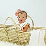baby, infant, basket, bow, headband, surprised, expression, blanket, white, soft, fur, cute, child, portrait, sitting, indoors, clothing, pink, woven, adorable
