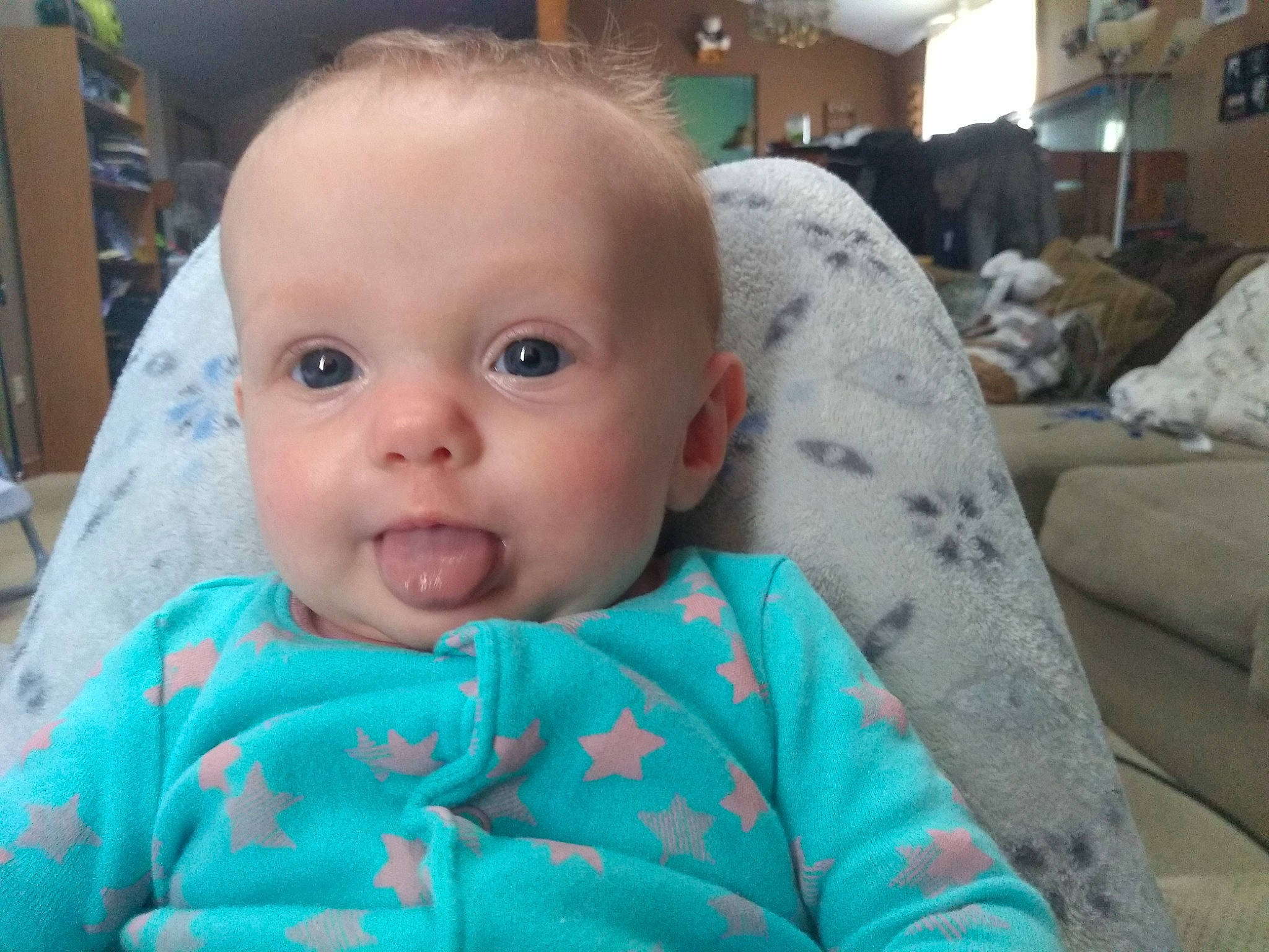 Lucy is registered to the contest to win money with this photo: baby, cheek, child, chin, ear, eye, eyebrow, face, forehead, head, iris, lip, mouth, nose, person, skin, smile, toddler