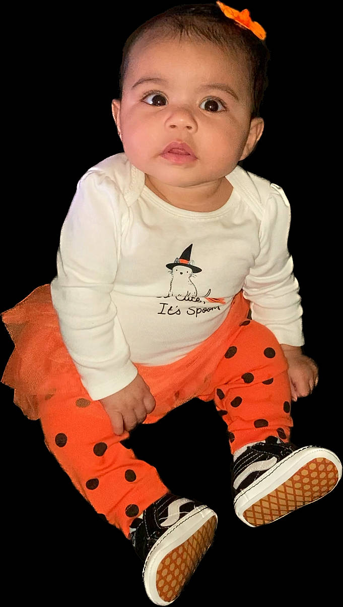 Jaylee is registered to the contest to win money with this photo: baby, baby_products, baby_toddler_clothing, carmine, cheek, child, happy, neck, orange, outdoor_shoe, pattern, person, personal_protective_equipment, pink, sitting, sleeve, sock, sportswear, t_shirt, toddler