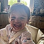 Lily-Rose a rejoint le concours — aidez-le/la à gagner de superbes lots ! toddler, child, smiling, chocolate, messy, high_chair, kitchen, window, natural_light, face_paint, happy, baby, eating, indoor, clothing, hair, furniture, person, cute, portrait
