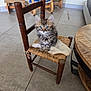 animal, cat, cozy, curious_eyes, cute, domestic_cat, floor, furniture, furry, home, indoor, kitten, knitted_cloth, living_room, pet, sitting, small_chair, tile_floor, wooden_chair, wooden_table