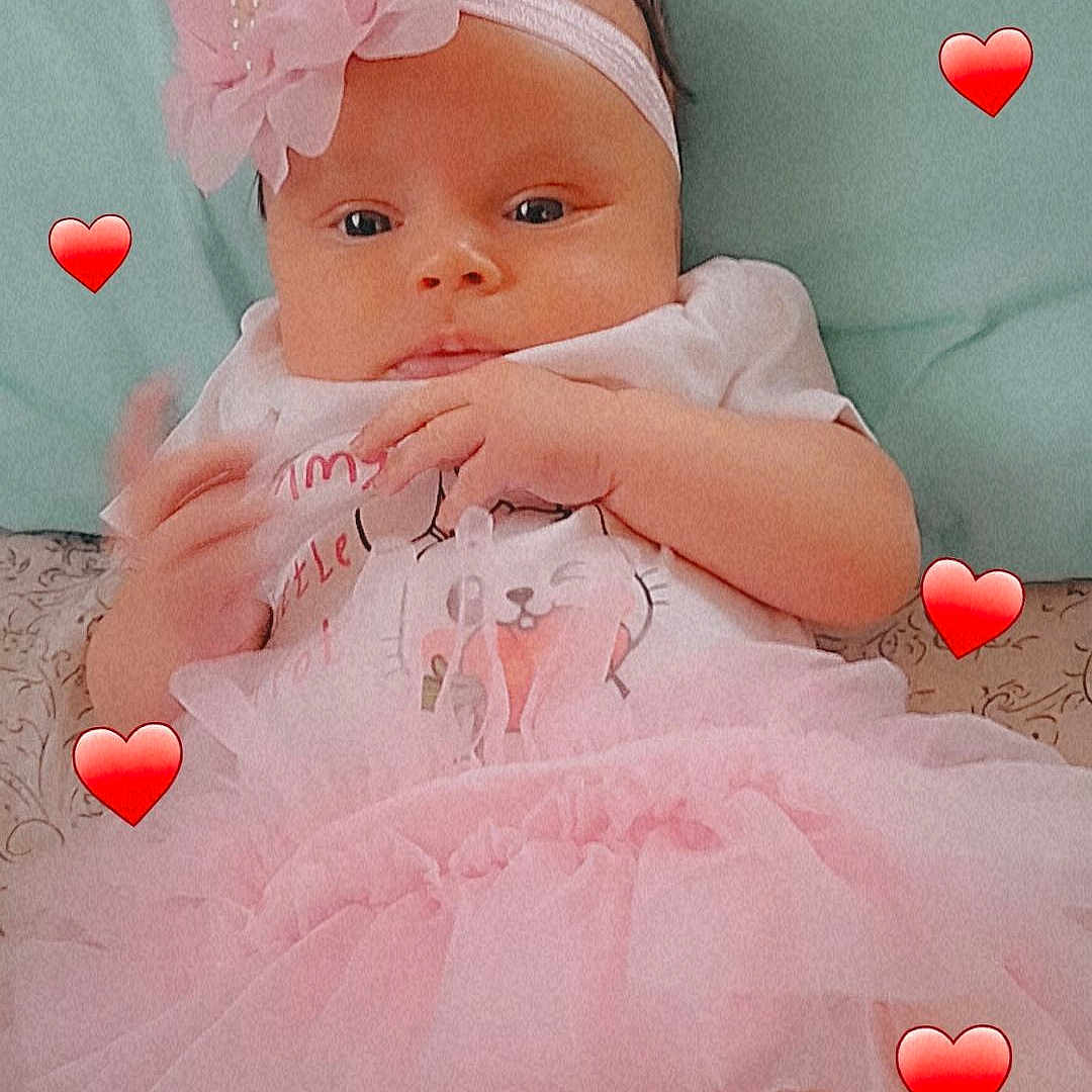 Olivia joined the competition — help win amazing prizes! baby, infant, tutu, pink, headband, flower, heart, love, cute, child, clothing, blanket, lying_down, adorable, small_hands, soft, portrait, indoors, sleepwear, baby_girl