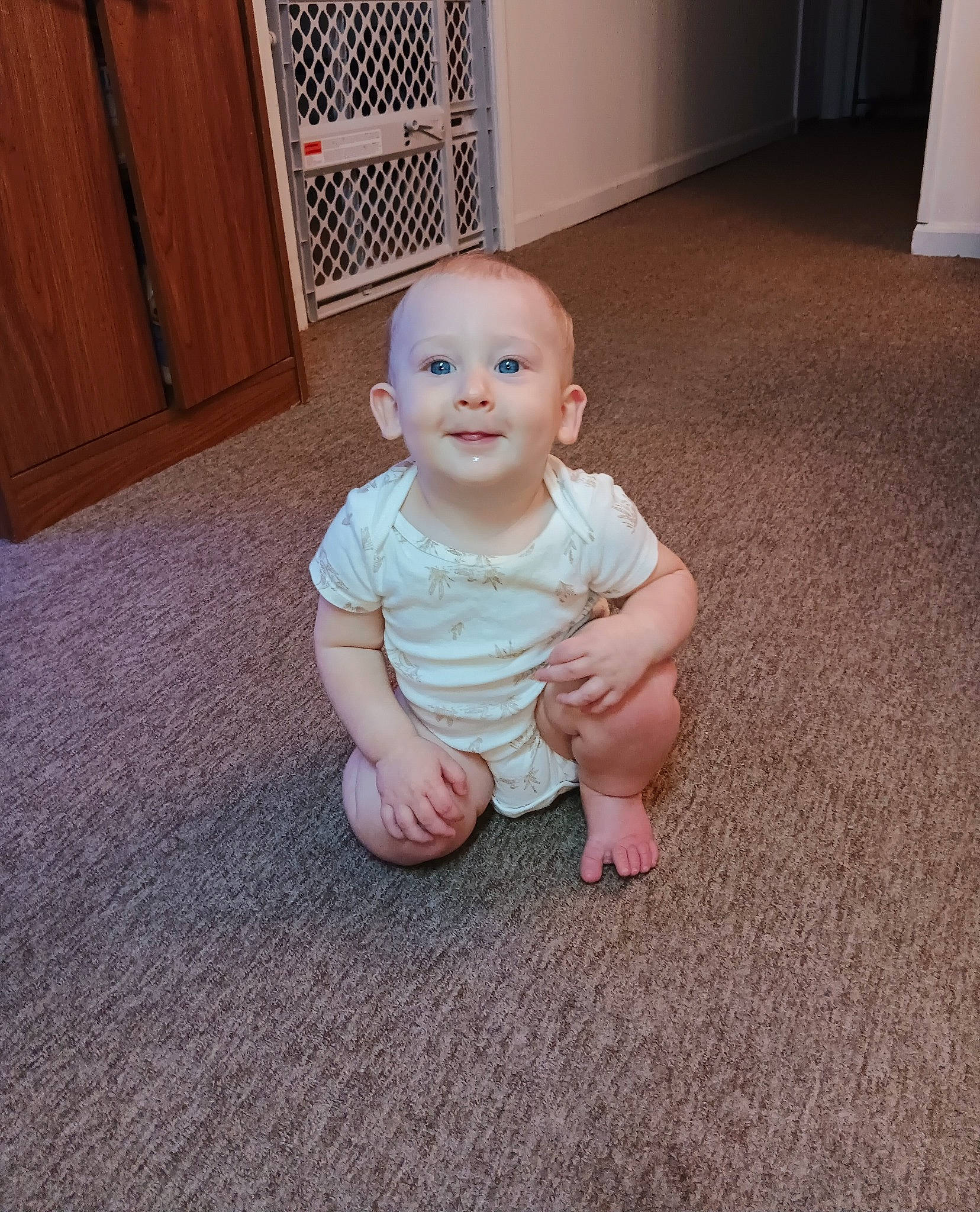 Kolten joined the competition — help win amazing prizes! baby, baby_toddler_clothing, cheek, child, floor, flooring, foot, fun, grass, happy, hardwood, human_leg, joy, mammal, person, sitting, skin, smile, thumb, toddler