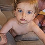 toddler, child, blue_eyes, blonde_hair, couch, sofa, hand_holding, adult, indoor, curious, climbing, person, skin, face, living_room, tattoo, bare_chest, pillow, close_up, expression