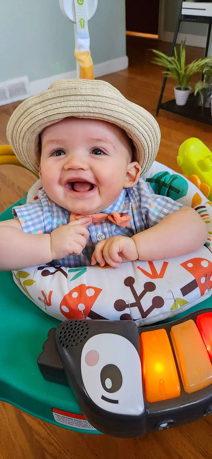 Liam joined the competition — help win amazing prizes! baby, baby_playing_with_toys, baby_products, baby_toddler_clothing, cap, child, comfort, facial_expression, fun, happy, hat, headwear, joy, organ, pattern, person, photograph, product, sitting, skin