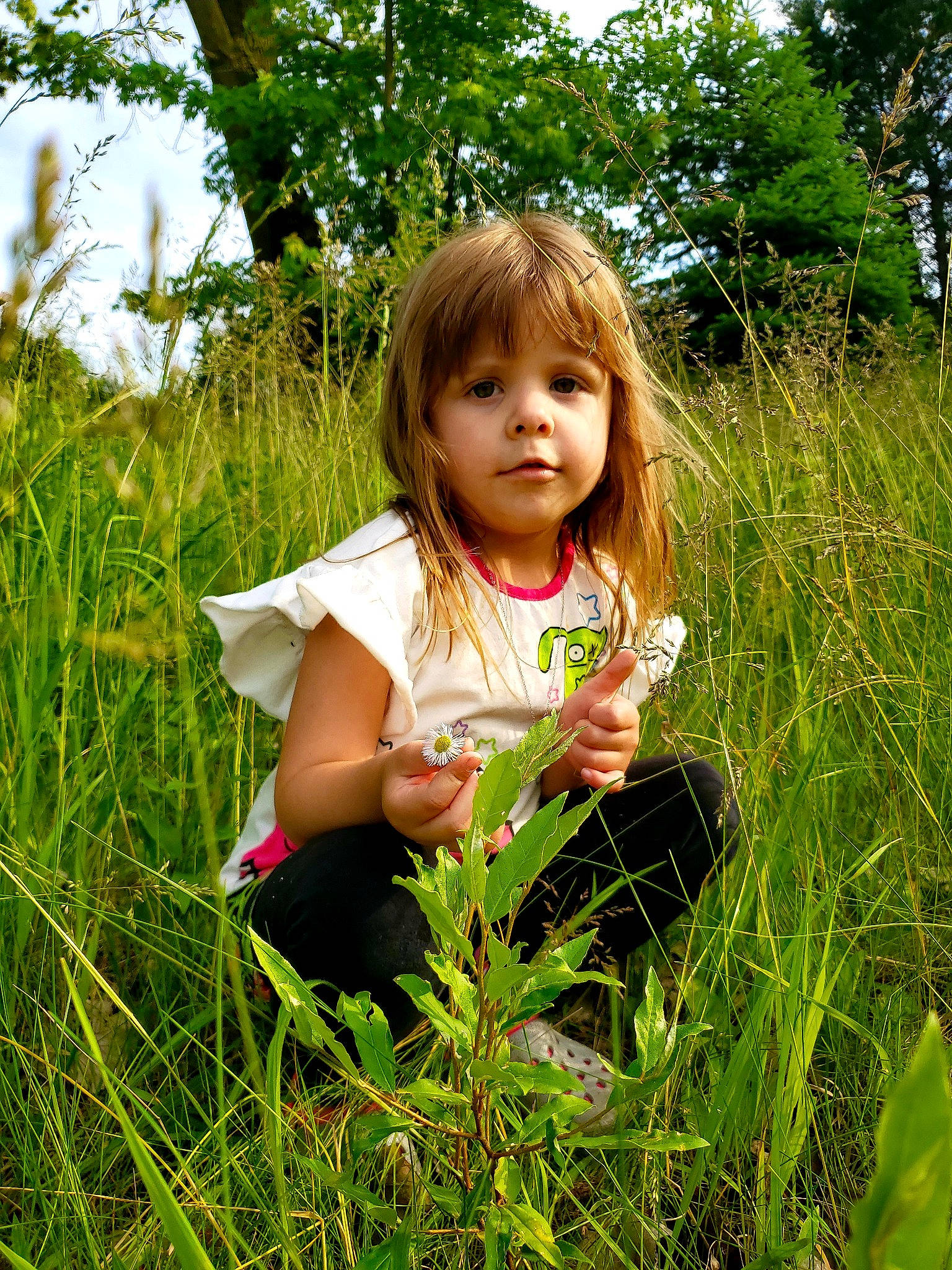 Indigo joined the competition — help win amazing prizes! beauty, botany, child, fun, grass, grass_family, green, happy, meadow, natural_environment, people_in_nature, person, plant, sitting, skin, smile, spring, summer, toddler, tree