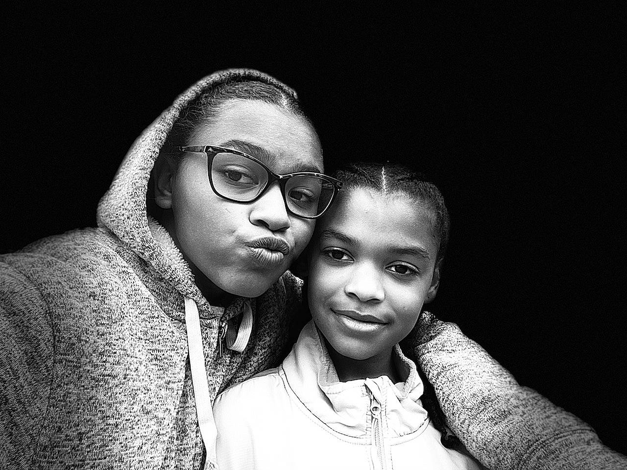 Alaysha joined the competition — help win amazing prizes! black, black_and_white, cheek, child, cool, eye, eyewear, flash_photography, fun, glasses, human, joy, monochrome, monochrome_photography, outerwear, people, person, photograph, photography, smile