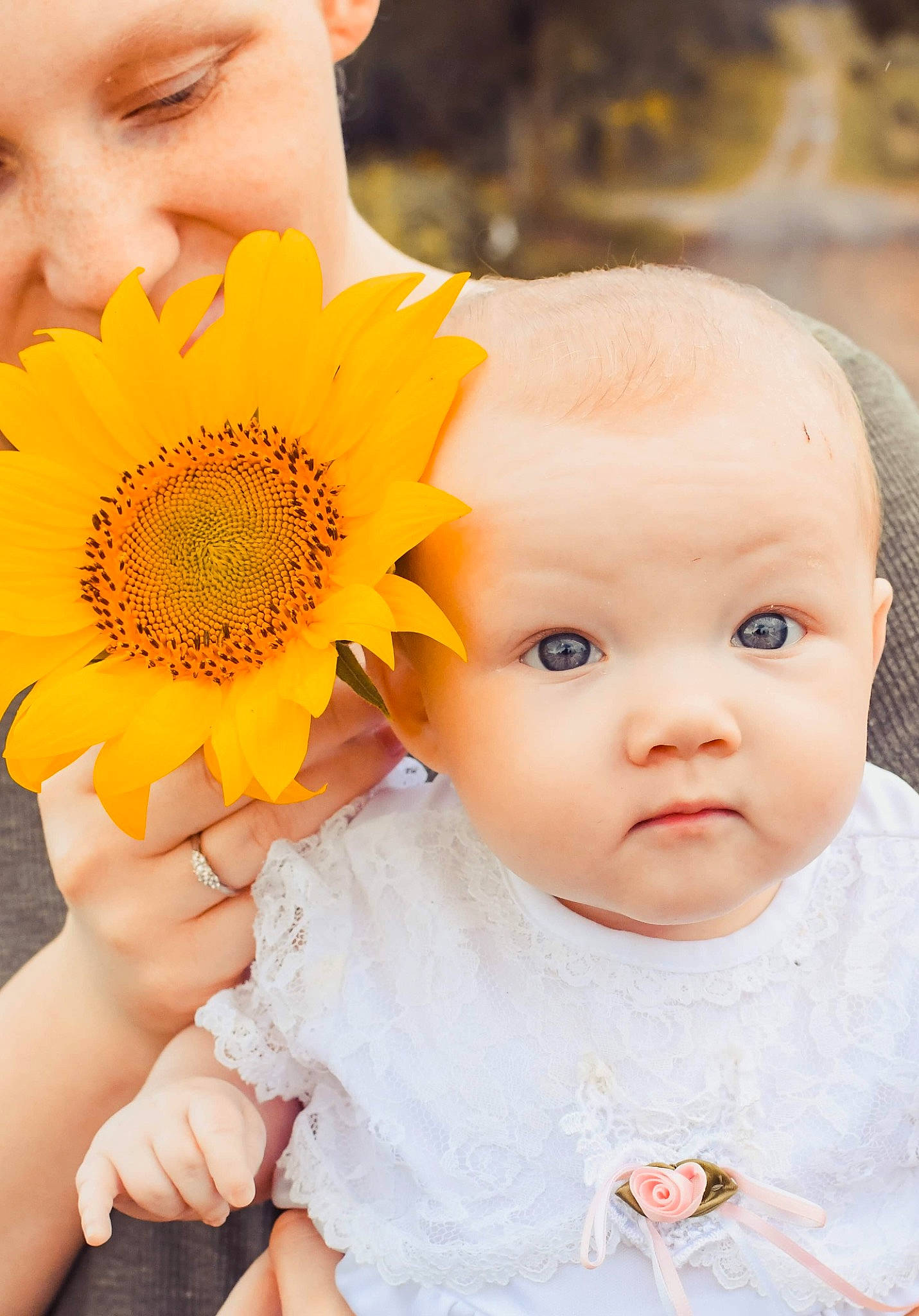 Addalyn joined the competition — help win amazing prizes! baby_toddler_clothing, blue, dress, eye, facial_expression, finger, flower, hairstyle, hand, happy, iris, people_in_nature, person, petal, photograph, plant, skin, summer, toddler, white