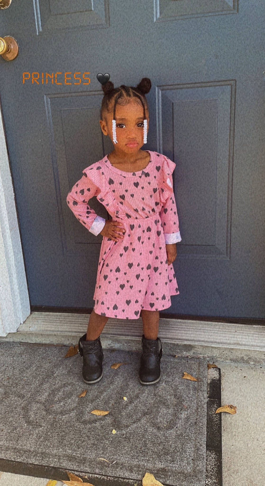 Londynn is registered to the contest to win money with this photo: child, costume, door, eyewear, face, fashion_accessory, fashion_design, footwear, hairstyle, knee, magenta, one_piece_garment, pattern, person, pink, purple, shoe, shoulder, sleeve, street_fashion