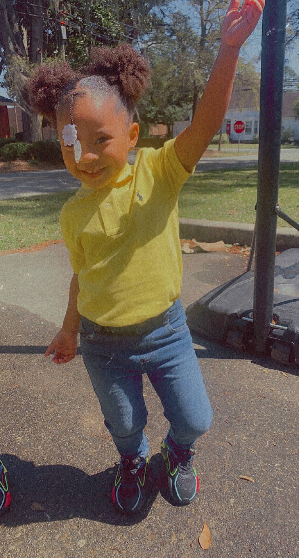 Laeani is registered to the contest to win money with this photo: asphalt, child, cool, denim, eyewear, fun, gesture, grass, happy, jeans, joy, leisure, person, plant, play, public_space, recreation, smile, t_shirt, toddler