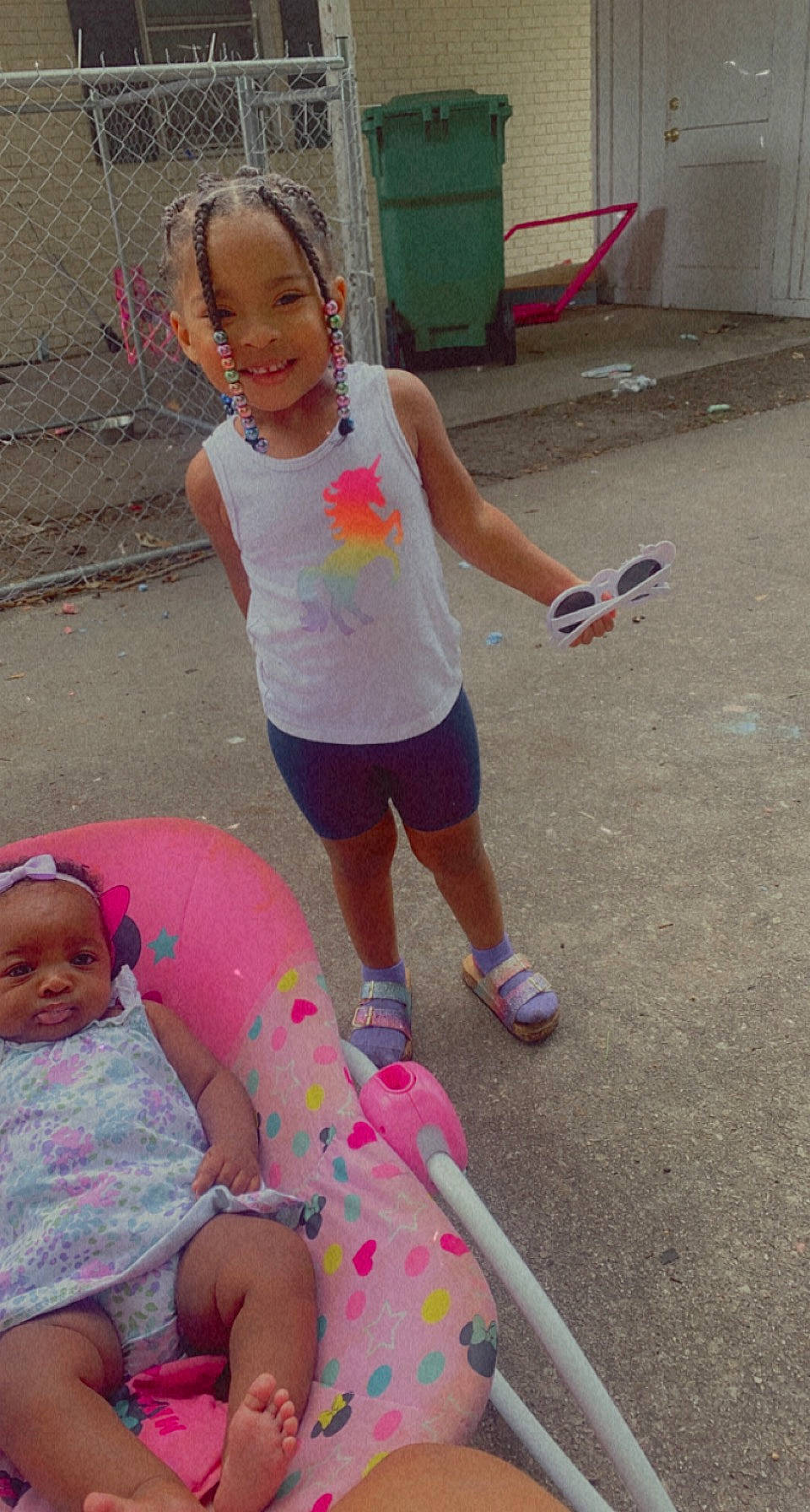 Laeani is registered to the contest to win money with this photo: child, event, face, fun, hair, happy, human_leg, joy, leg, leisure, magenta, mouth, people, person, pink, recreation, shorts, summer, t_shirt, thigh