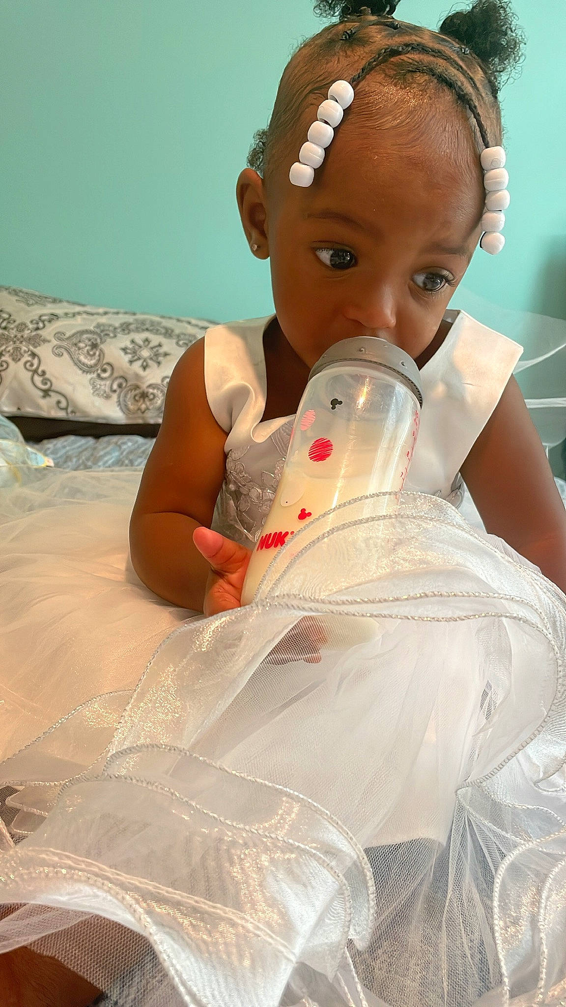 Laitynn Rose is registered to the contest to win money with this photo: bathing, beauty, black_hair, bridal_accessory, dress, earrings, eyebrow, eyelash, fashion_design, hair, hairstyle, happy, head, headgear, headpiece, human_leg, jewellery, person, skin, textile